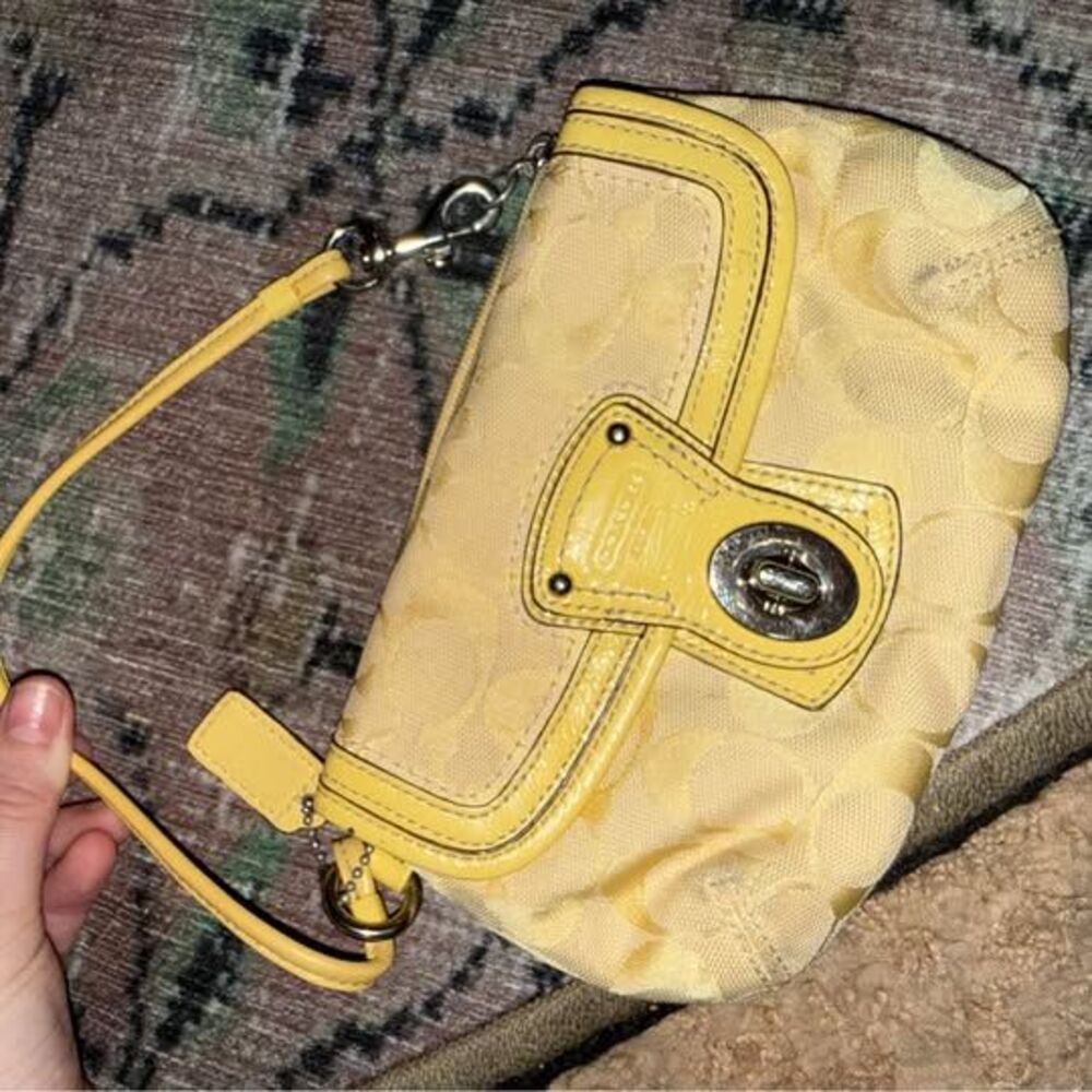 vintage yellow Coach Legacy Signature Turnlock Wristlet